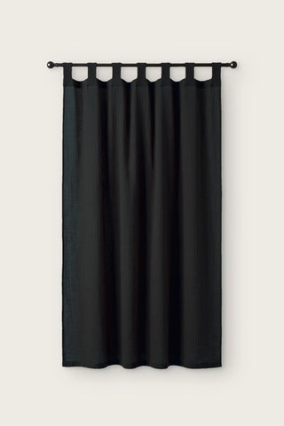 2-layer muslin cotton curtain panel in black, single tab top panel on a black rod, front view
