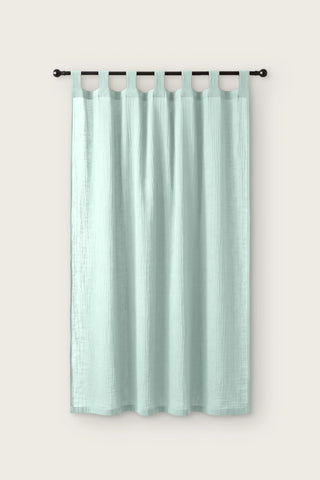 2-layer muslin cotton curtain panel in mint, single tab top panel on a black rod, front view