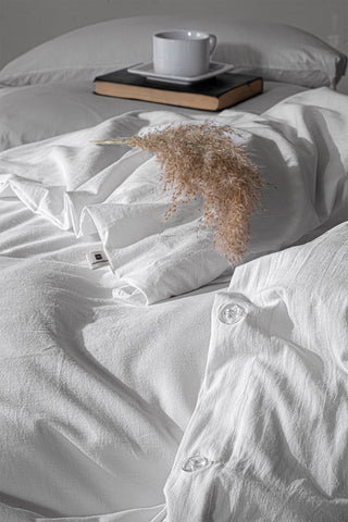 Natural stonewashed duvet cover styled bedroom view - breathable Aegean cotton linen