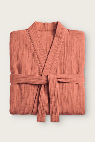 Handwoven 2-layer muslin kimono bathrobe in terracotta, folded front view with tied belt