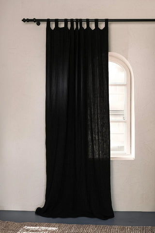 Black tab top panel arched window interior. Handwoven 2-layer muslin cotton curtain, Denizli, OEKO-TEX. Vivamaison.