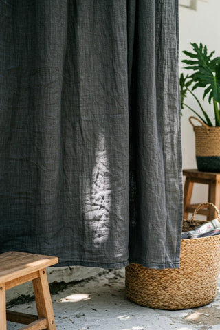 Gray panel lower hem closeup, plant basket. Handwoven 2-layer muslin cotton curtain, Denizli, OEKO-TEX. Vivamaison.