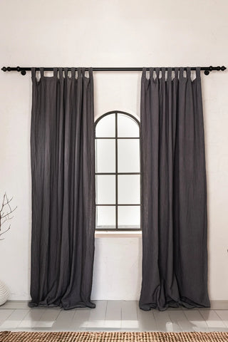 Charcoal gray tab top panels, arched window. Handwoven 2-layer muslin cotton curtain, Denizli, OEKO-TEX. Vivamaison.