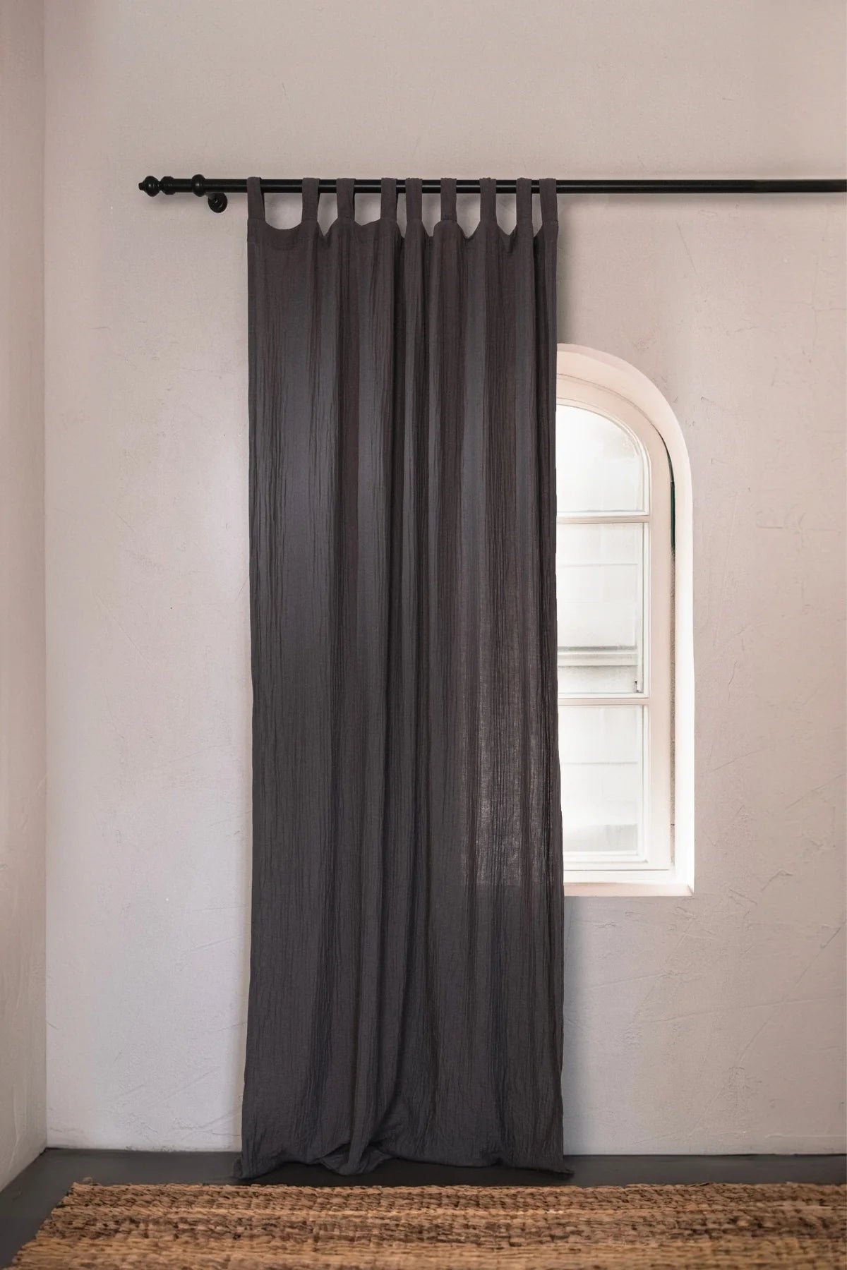 Anthracite gray tab top panel arched window. Handwoven 2-layer muslin cotton curtain, Denizli, OEKO-TEX. Vivamaison.