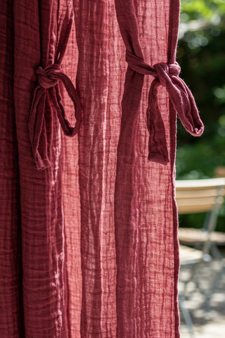 Close-up tieback bow knots on gauze fabric. Handwoven 2-layer muslin cotton curtain, Denizli, OEKO-TEX. Vivamaison.