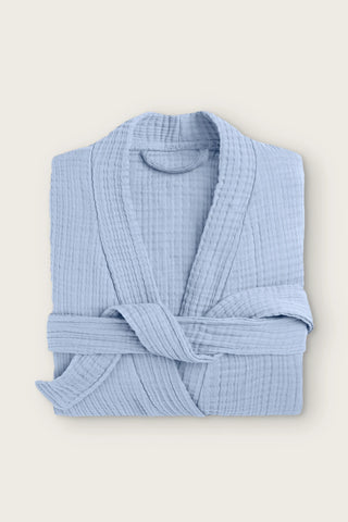 Handwoven 4-layer muslin kimono bathrobe in indigo blue, folded front view with wrapped belt