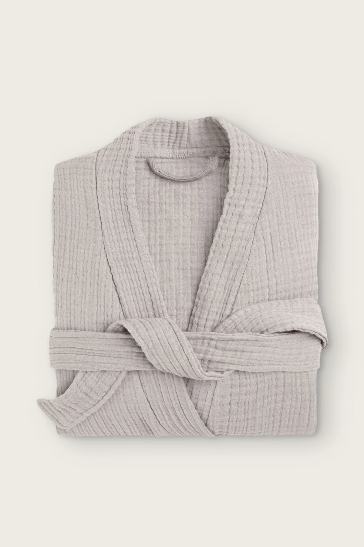 Handwoven 4-layer muslin kimono bathrobe in light gray, folded front view with wrapped belt