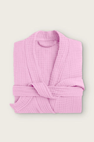 Handwoven 4-layer muslin kimono bathrobe in pink, folded front view with wrapped belt