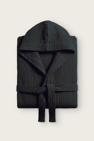 Handwoven 4-layer muslin hooded bathrobe in black, folded front view with hood and tied belt