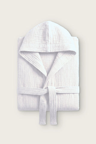Handwoven 4-layer muslin hooded bathrobe in white, folded front view with hood and tied belt