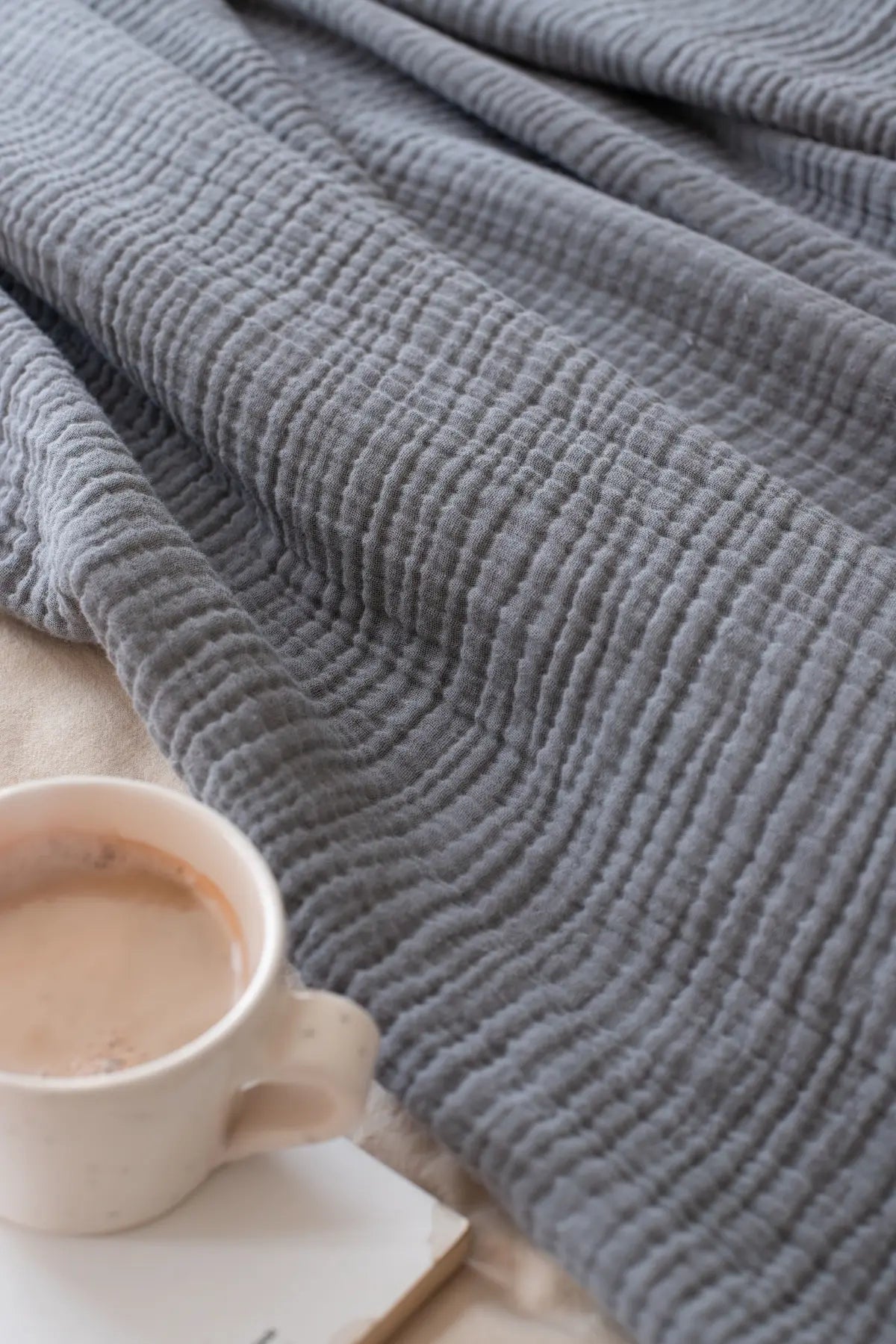 Anthracite handwoven 4-layer muslin Turkish cotton bedspread styled bedroom. Long-staple Denizli, OEKO-TEX. Vivamaison.