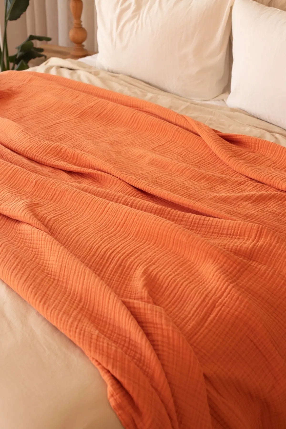 Tile handwoven 4-layer muslin Turkish cotton bedspread folded flat lay. Long-staple Denizli, OEKO-TEX. Vivamaison.