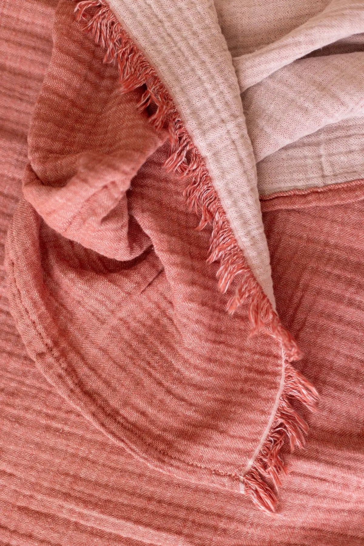 Terracotta handwoven 4-layer soft muslin fringed bedspread fringe detail. Tasseled edges, Denizli, OEKO-TEX. Vivamaison.