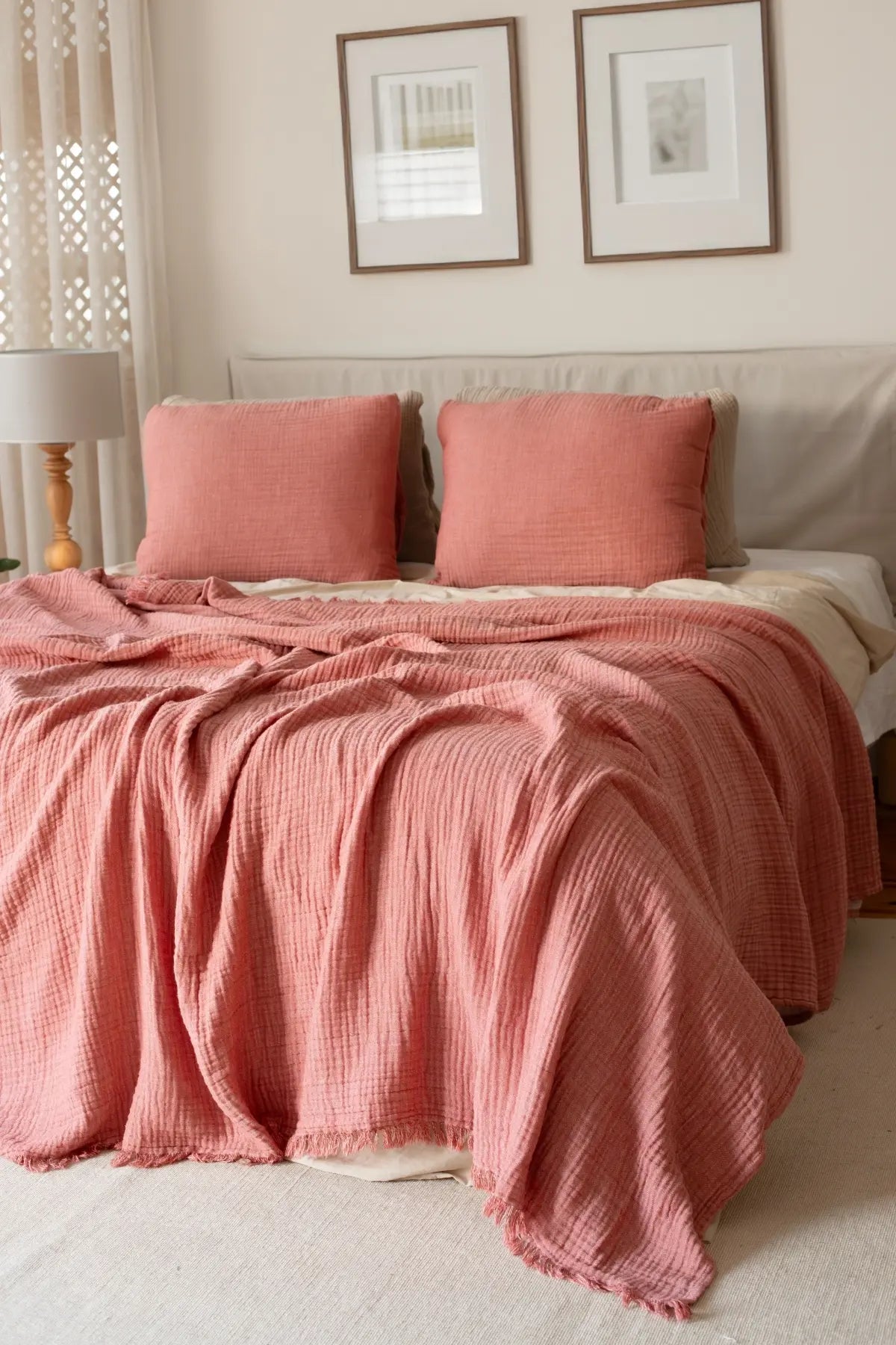 Terracotta handwoven 4-layer soft muslin fringed bedspread styled bedroom. Tasseled edges, Denizli, OEKO-TEX. Vivamaison.