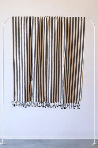 Black classic striped peshtemal towel hanging full view. Handwoven Turkish cotton Denizli, OEKO-TEX. Vivamaison.