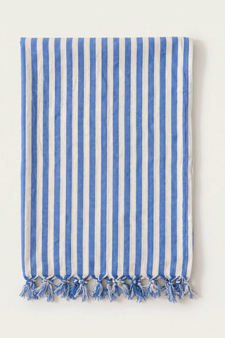 Classic striped Turkish cotton peshtemal towel in blue, folded front view with knotted fringe