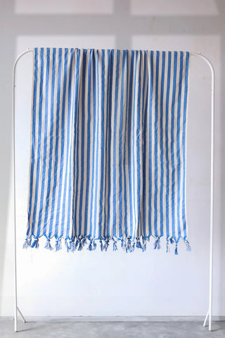 Blue classic striped peshtemal towel hanging full view. Handwoven Turkish cotton Denizli, OEKO-TEX. Vivamaison.