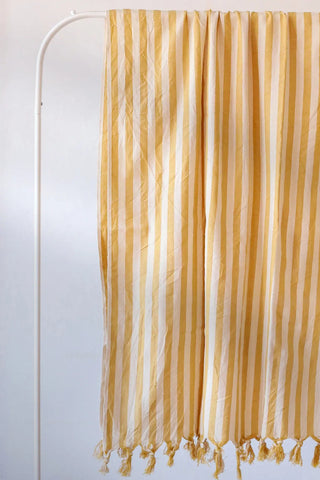 Yellow classic striped peshtemal towel fringe detail closeup. Handwoven Turkish cotton Denizli, OEKO-TEX. Vivamaison.