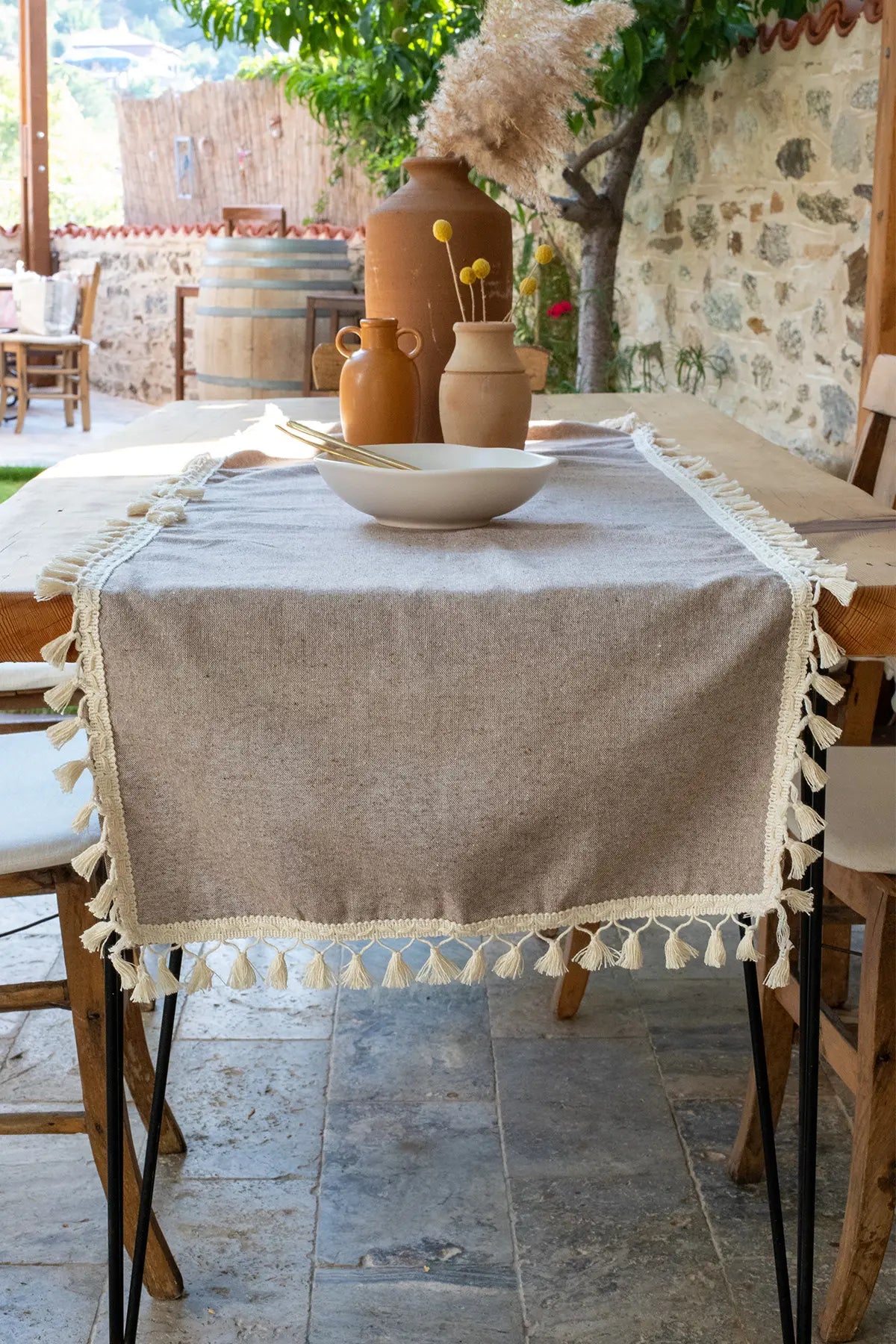 Brown handwoven Turkish cotton tassel table runner detail. Hand-tied tassels Denizli, OEKO-TEX. Vivamaison.
