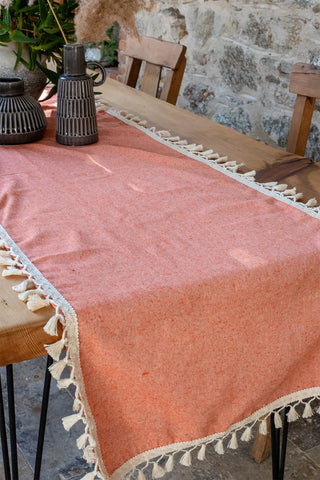 Orange handwoven Turkish cotton tassel table runner lifestyle. Hand-tied tassels Denizli, OEKO-TEX. Vivamaison.