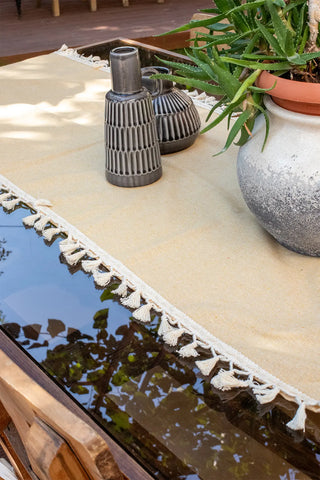 Yellow handwoven Turkish cotton tassel table runner detail. Hand-tied tassels Denizli, OEKO-TEX. Vivamaison.