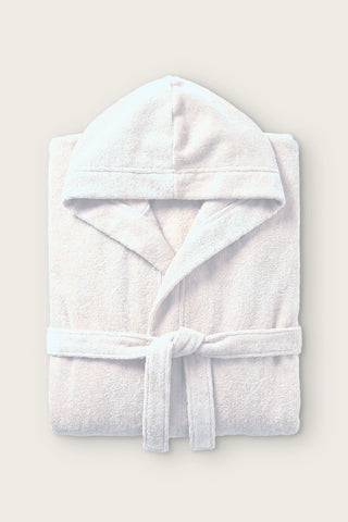 Handwoven Turkish cotton terry hooded bathrobe in white, folded front view with hood and tied belt