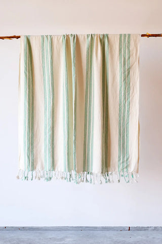 Green elegant striped peshtemal towel hanging full view. Handwoven Turkish cotton Denizli, OEKO-TEX. Vivamaison.