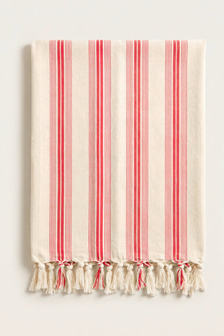 Elegant striped Turkish cotton peshtemal towel in red, folded front view with grouped stripes and knotted fringe