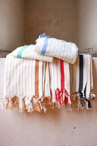 5 luxury striped peshtemal towels stacked color collection. Handwoven Turkish cotton Denizli, OEKO-TEX. Vivamaison.