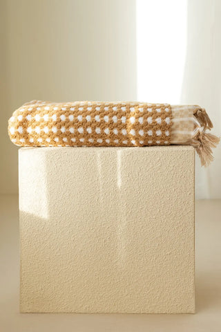 Mustard handwoven Turkish cotton pom pom woven towel set detail. Tasseled fringe Denizli, OEKO-TEX. Vivamaison.