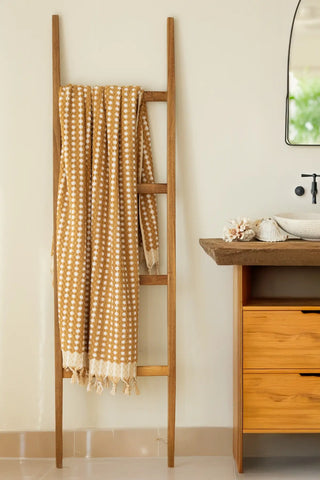 Mustard handwoven Turkish cotton pom pom woven towel set ladder hanging. Tasseled fringe Denizli, OEKO-TEX. Vivamaison.