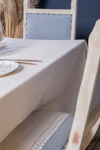 Natural handwoven raw linen lace tablecloth lace edge close up. Hand-crocheted lace border, Denizli, OEKO-TEX. Vivamaison.
