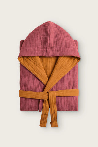 Reversible 4-layer muslin hooded bathrobe, burgundy outer and caramel inner, folded front view
