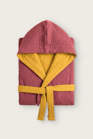 Reversible 4-layer muslin hooded bathrobe, burgundy outer and mustard inner, folded front view