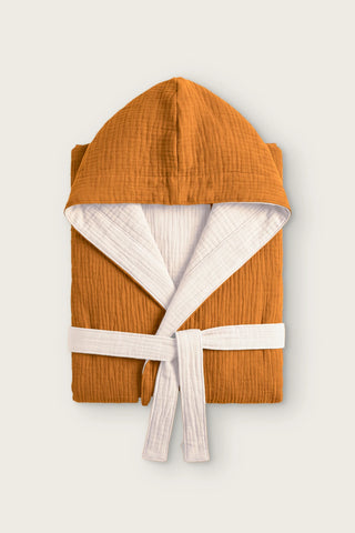 Reversible 4-layer muslin hooded bathrobe, caramel outer and ecru inner, folded front view
