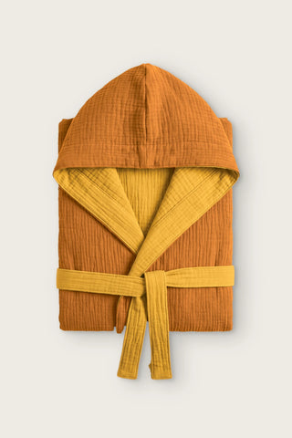 Reversible 4-layer muslin hooded bathrobe, caramel outer and mustard inner, folded front view