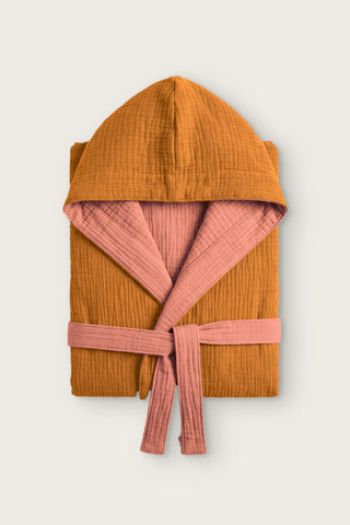 Reversible 4-layer muslin hooded bathrobe, caramel outer and terracotta inner, folded front view