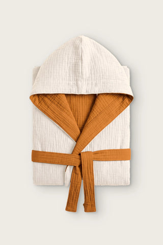 Reversible 4-layer muslin hooded bathrobe, ecru outer and caramel inner, folded front view