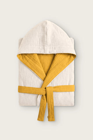 Reversible 4-layer muslin hooded bathrobe, ecru outer and mustard inner, folded front view