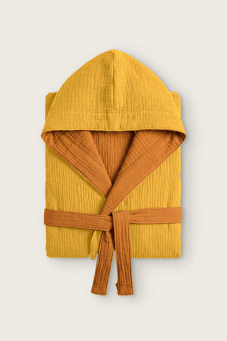 Reversible 4-layer muslin hooded bathrobe, mustard outer and caramel inner, folded front view
