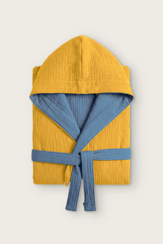 Reversible 4-layer muslin hooded bathrobe, mustard outer and indigo blue inner, folded front view