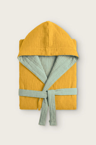 Reversible 4-layer muslin hooded bathrobe, mustard outer and sage green inner, folded front view