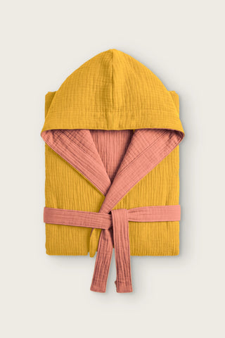 Reversible 4-layer muslin hooded bathrobe, mustard outer and terracotta inner, folded front view