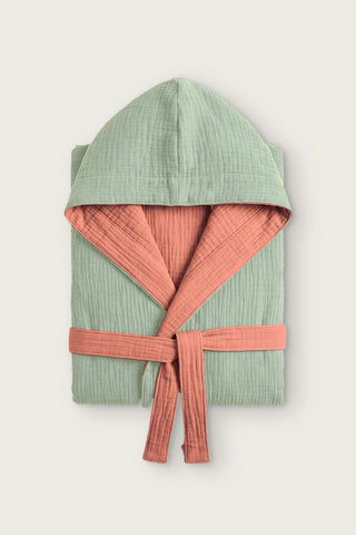 Reversible 4-layer muslin hooded bathrobe, sage green outer and terracotta inner, folded front view