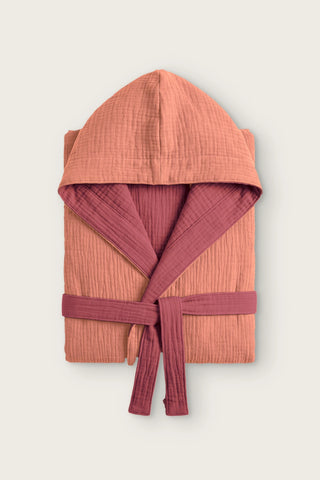 Reversible 4-layer muslin hooded bathrobe, terracotta outer and burgundy inner, folded front view