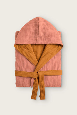 Reversible 4-layer muslin hooded bathrobe, terracotta outer and caramel inner, folded front view