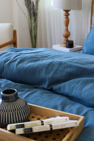 Indigo Blue handwoven soft muslin Turkish cotton plain duvet cover folded flat lay. Long-staple Denizli, OEKO-TEX. Vivamaison