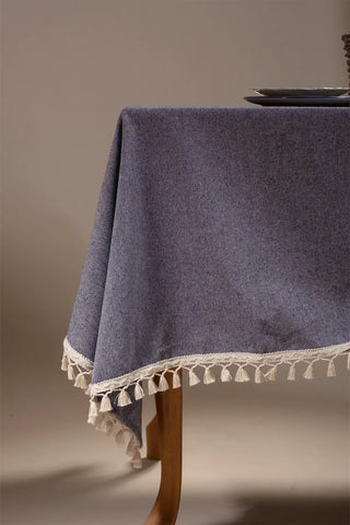 Navy Blue handwoven solid color Turkish cotton tassel tablecloth folded flat lay. Tasseled edges Denizli, OEKO-TEX. Vivamaiso