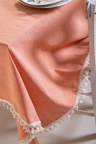Orange handwoven solid color Turkish cotton tassel tablecloth detail. Tasseled edges Denizli, OEKO-TEX. Vivamaison.