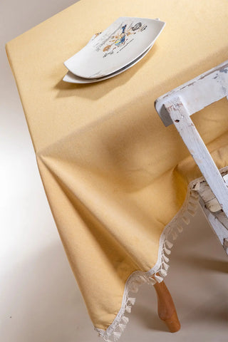 Yellow handwoven solid color Turkish cotton tassel tablecloth lifestyle. Tasseled edges Denizli, OEKO-TEX. Vivamaison.